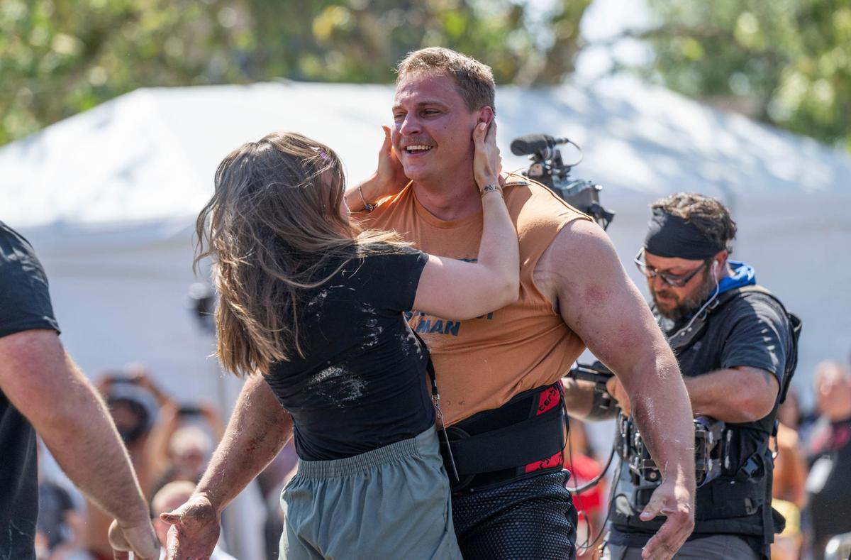 Newlyweds Monja and Rayno Nel celebrate his Worlds’ Strongest Man victory after the final atlas stones event on Sunday in Old Sacramento. Nel is the first South African to win the competition.