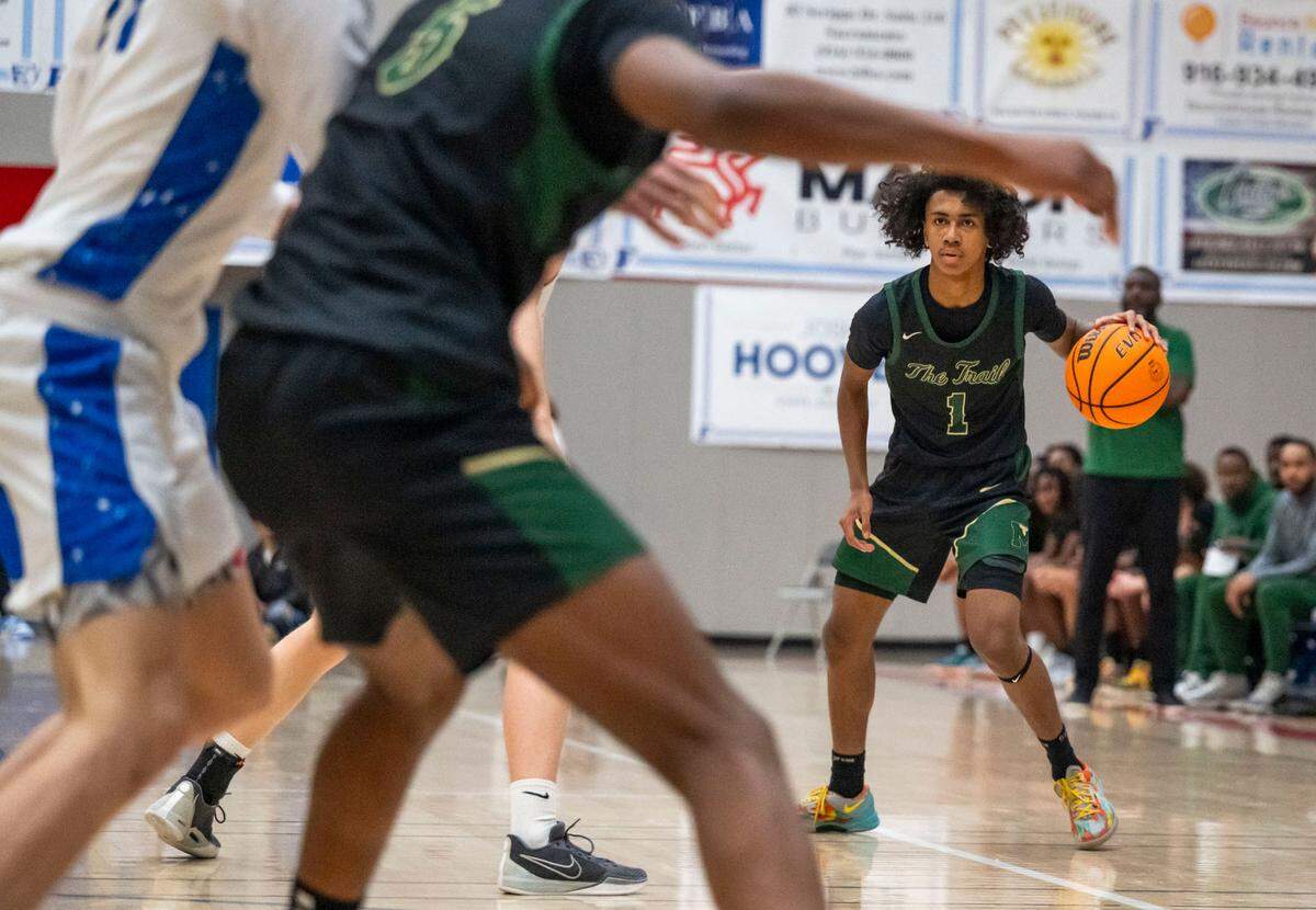 Monterey Trail Mustangs guard Rashawn Inglemon (1) looks to pass against Folsom in January.