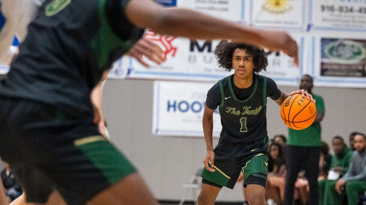 Monterey Trail Mustangs guard Rashawn Inglemon (1) looks to pass against Folsom during a boys basketball game in Folsom on Saturday.