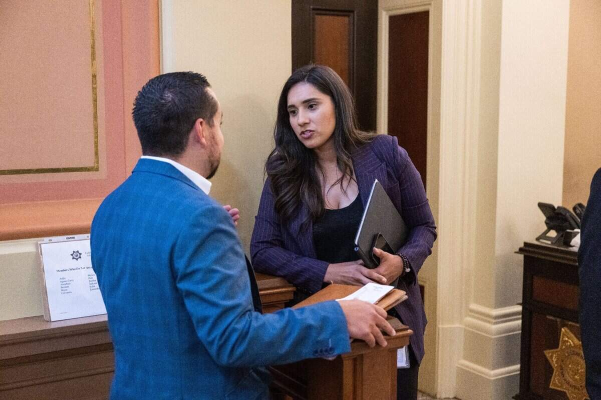 Assemblywoman Sabrina Cervantes, D-Riverside, speaks to a lobbyist on Tuesday. Cervantes and a group of other of Assembly members do not accept business cards from lobbyists.
