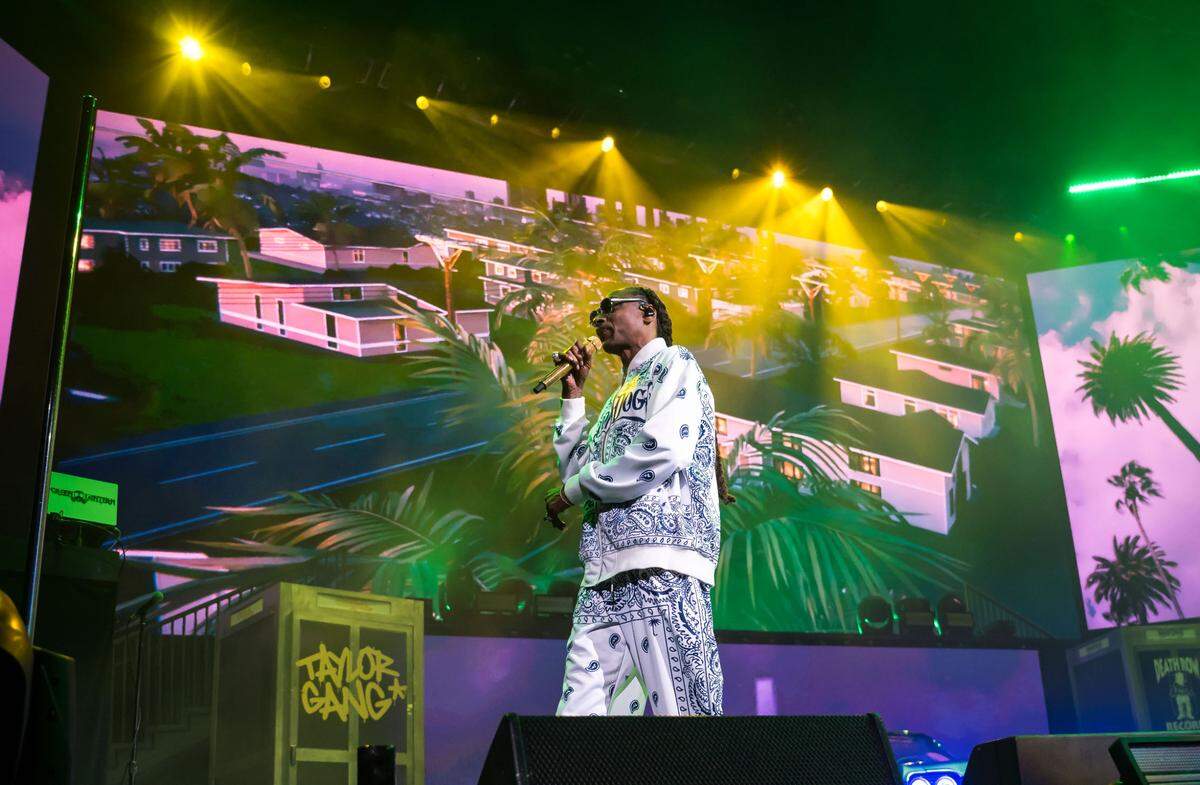 Rap icon Snoop Dogg performs “Nuthin’ but a ‘G’ Thang” from Dr. Dre’s “The Chronic” album at his High School Reunion Tour stop in Sacramento in 2023. 