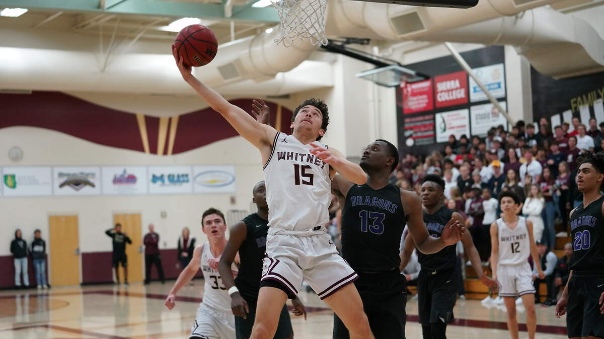 Whitney’s Liam Graf hits a layup during his school’s win over Sacramento on Friday night.