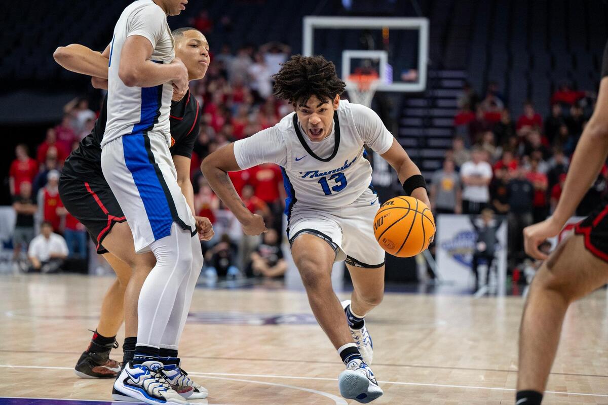 The Rocklin Thunder’s Josiah Andrews (13) drives to the basket in the second half against the Jesuit Marauders’ in the CIF Sac-Joaquin Section Division ll championship at Golden 1 Center on Thursday, Feb. 27.