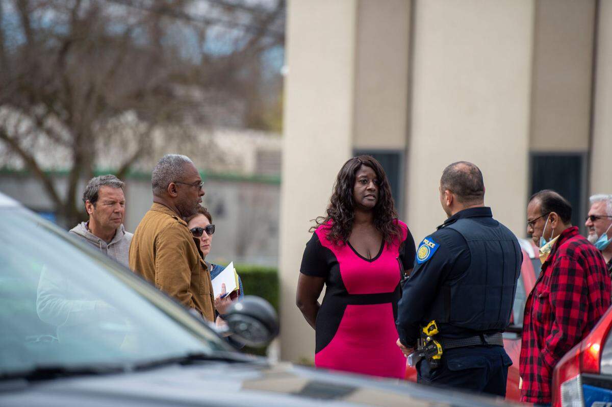 Irene Green, vice president of bargaining for SEIU Local 1000 talks with a Sacramento police officers outside the headquarters in Sacramento on March 5. SEIU Local 1000 President Richard Louis Brown and about 20 of his supporters were occupying the building after gaining access without a key during a protest. Brown had been locked out of the building after three union vice presidents, including Green, had taken action to suspend him.