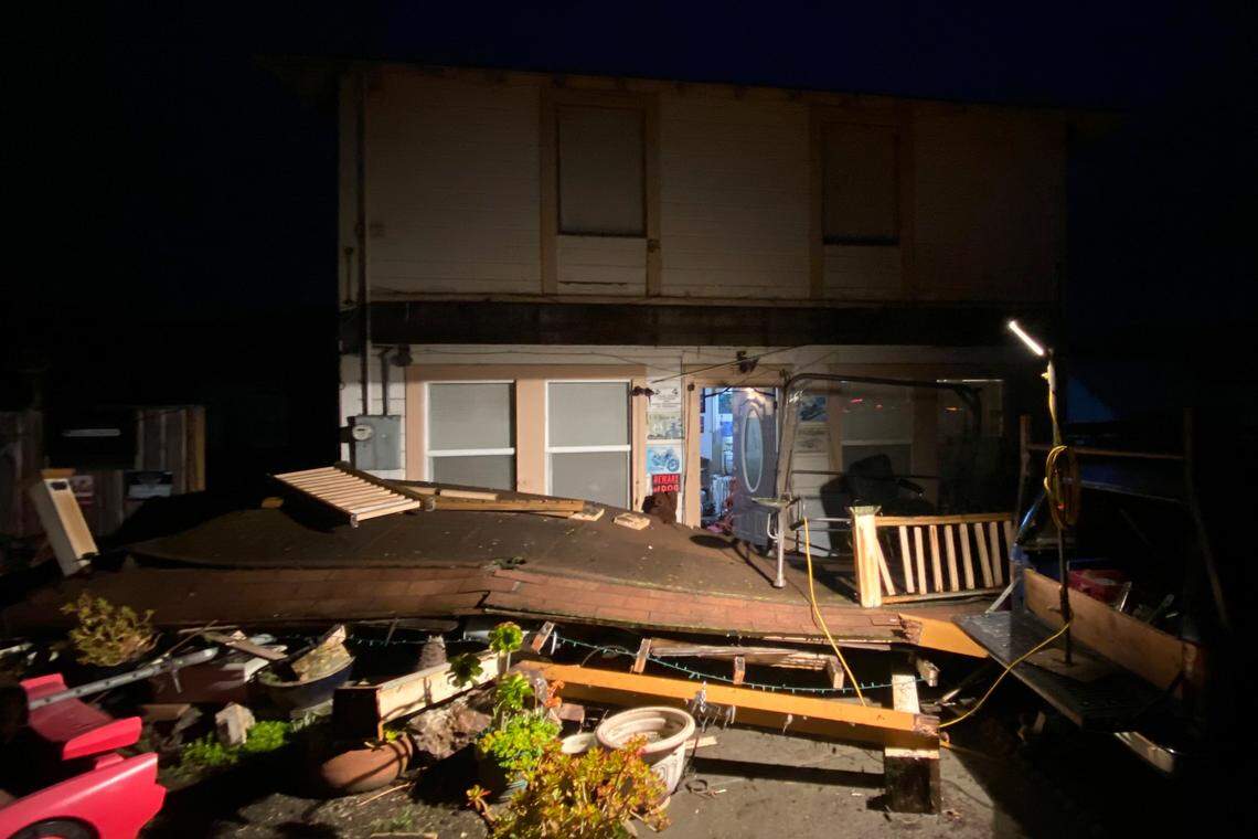 Earthquake damage is seen outside a building in Rio Dell, Calif., Tuesday, Dec. 20, 2022. A strong earthquake shook parts of Northern California early Tuesday, jolting residents awake, cutting off power to thousands, and causing some damage to buildings and roads, officials said. (Kent Porter/The Press Democrat via AP)