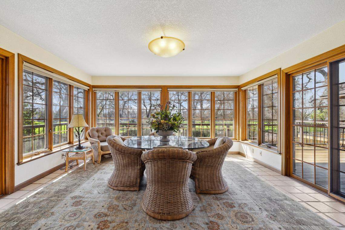 Sweeping views from the sunroom in the main house invite you to relax as boats move along the iconic “S-curve” of the Sacramento River.