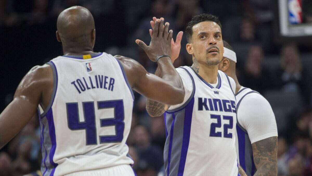 Kings teammates Matt Barnes and Anthony Tolliver celebrate during a game at Golden 1 Center on Feb. 12, 2017. Barnes is playing in The Basketball Tournament, a $2 million winner-take-all event. Tolliver is a booster in the tournament.