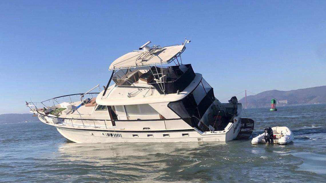 Two people and three dogs required rescue Saturday, Nov. 26, after their boat hit rocks on Alcatraz Island in the San Francisco Bay, California firefighters say.
