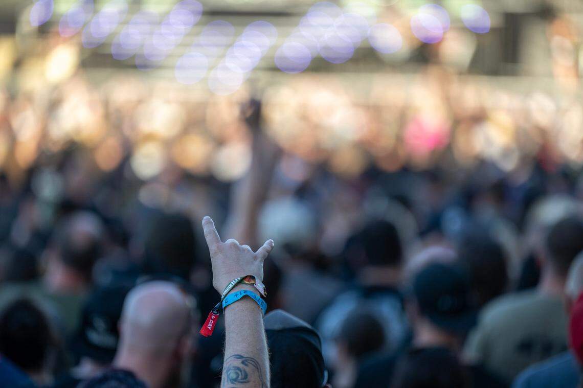 Festival attendees show their respect during a show on the first day of the Aftershock festival on Thursday, Oct. 10, 2024 at Discovery Park.