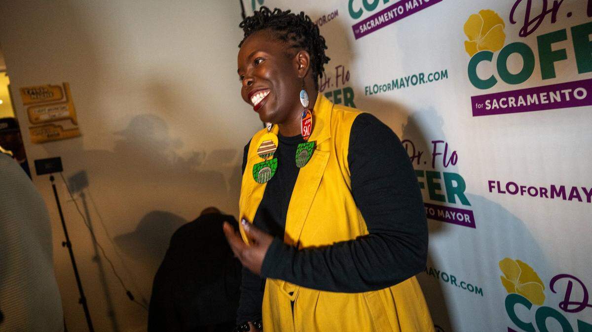 Sacramento mayoral candidate Flojaune Cofer thanks supporters during an Election Night party at Tipsy Putt in downtown Sacramento in November 2024. A new lawsuit filed in Sacramento County seeks to block election officials from placing the title “doctor” under her name on the June 2 primary ballot for the 1st District Board of Supervisors race.