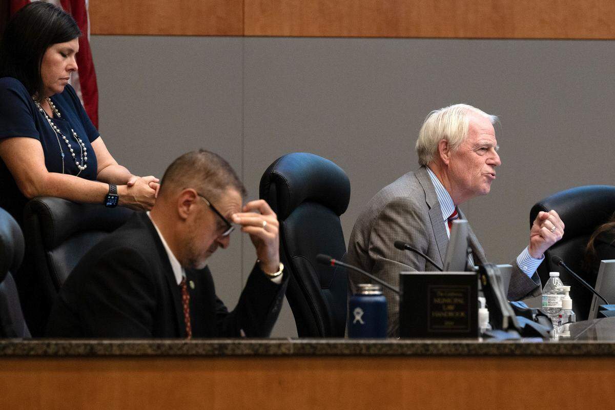 Councilmember Roger Dickinson gestures as he votes against charging fees for seniors to live in micro-communities during a Sacramento City Council meeting on Tuesday.