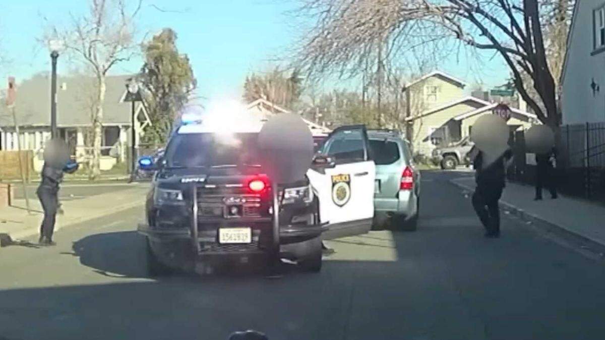 Police said they discharged their duty weapons toward a carjacked vehicle as a suspect was attempting to flee Friday, Feb. 9, 2023. The suspect was treated for non-life-threatening injuries and one officer also was hurt in the incident.