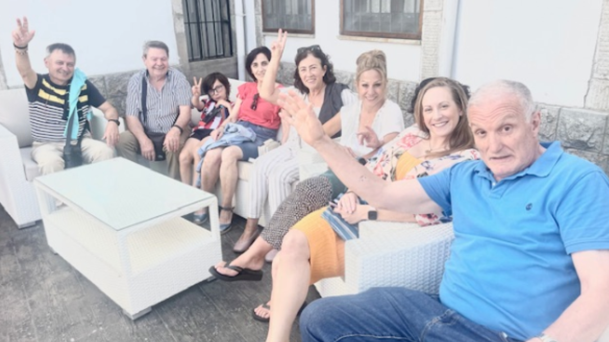 Susan Hutchens poses for a photo with family members in Northern Spain.