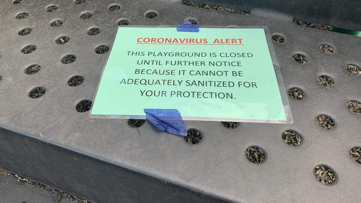 A sign has been posted advising visitors that the playground at Seely Park was closed on Tuesday March 24, 2020, to slow the coronavirus spread. The park on Pope Avenue in Arden Arcade in Sacramento, California is part of the Fulton-El Camino Recreation & Park District.