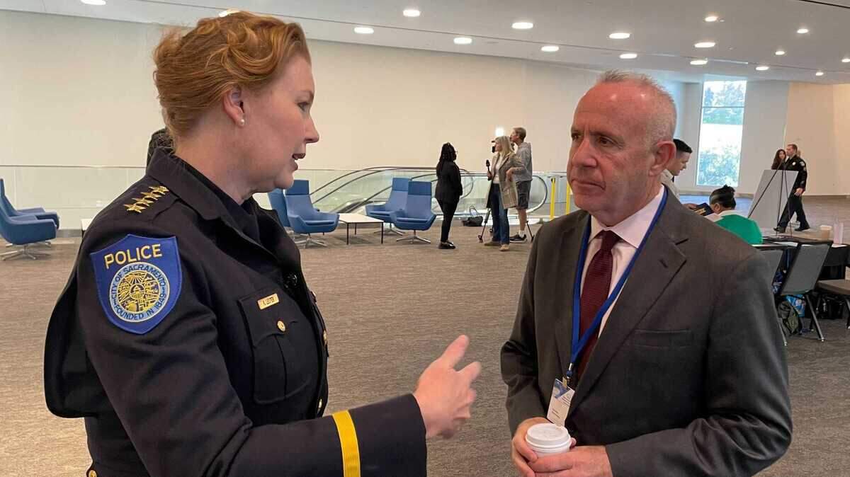 Sacramento Police Chief Kathy Lester, left, talks with Sacramento Mayor Darrell Steinberg at the Violent Crime Reduction Summit at SAFE Credit Union Convention Center on Friday. Police and city leaders met with community groups at the daylong event to discuss ways to tackle violent crime and build trust in the city’s neighborhoods.
