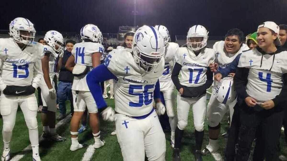 Zephaniah Wright (56) and Capital Christian have won six games in a row after knocking off West Park, 41-34, in Friday’s Division IV semifinal.