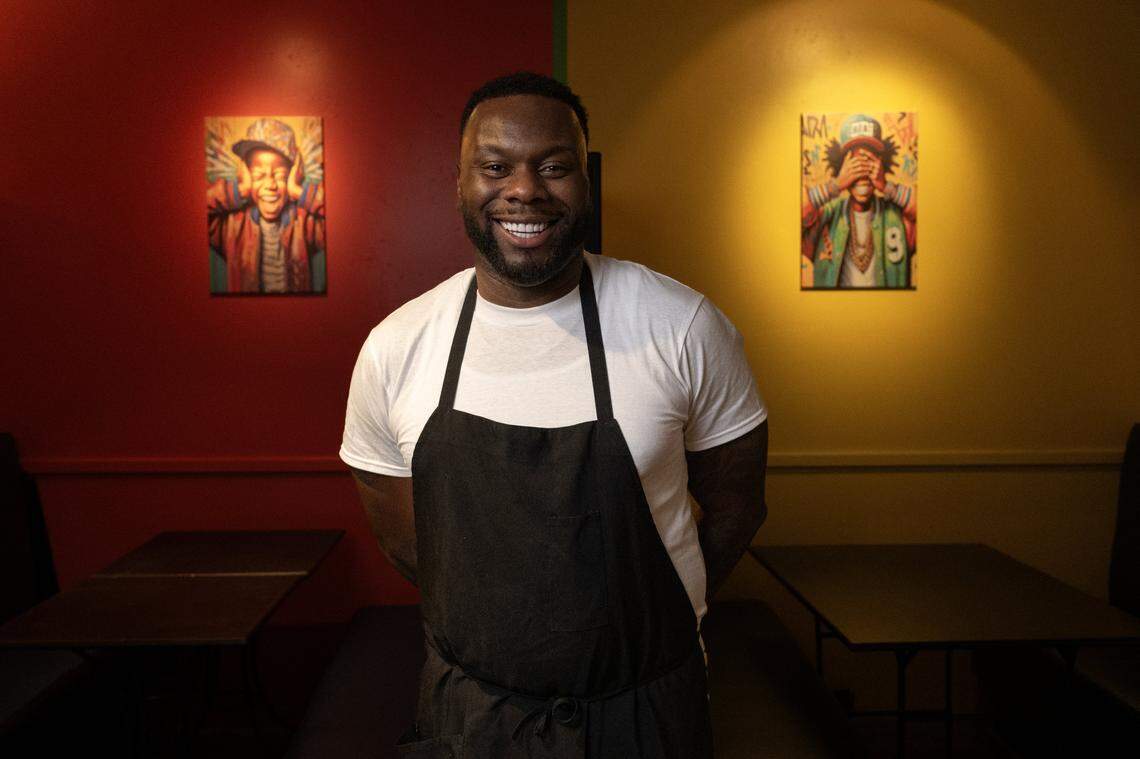 J.P. Perkins, managing partner of Calabash Caribbean in Sacramento, poses in one of the restaurant’s dining rooms on Nov. 21, 2025.
