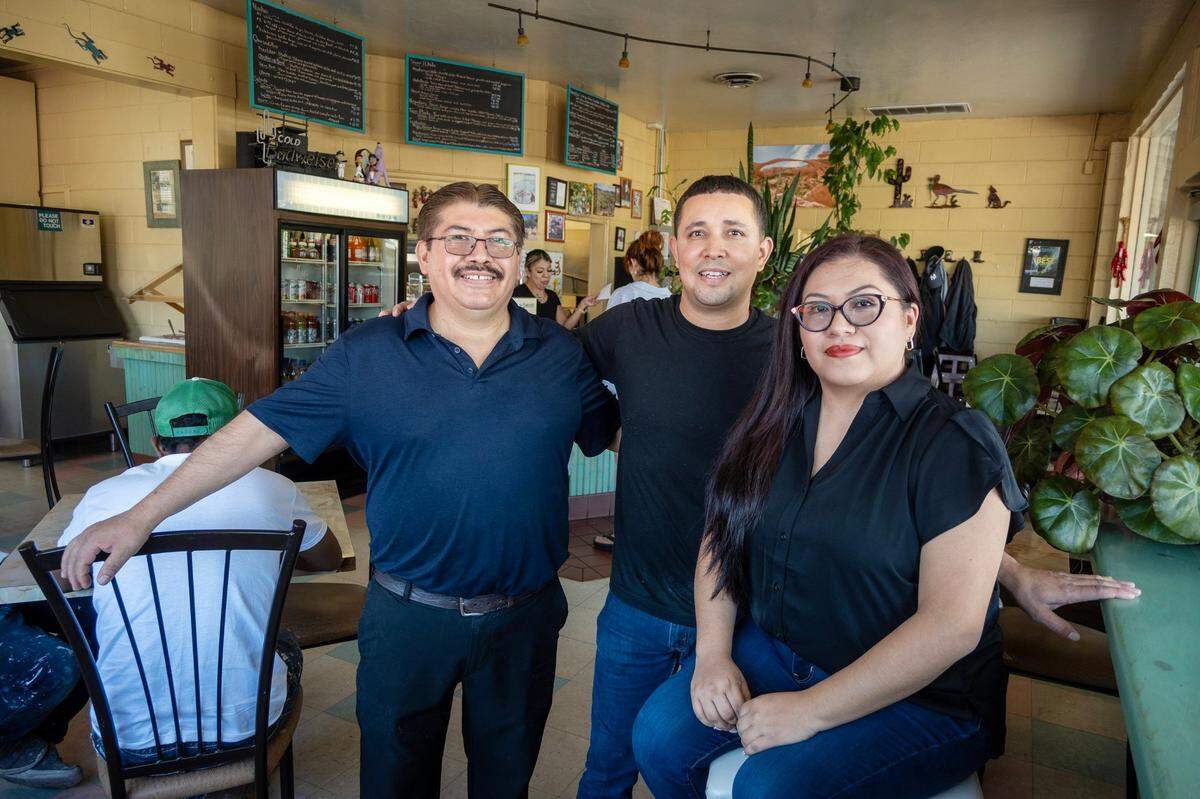 Nopalitos owners Roberto Timoteo, William Velasquez and Nallie Timoteo stand together at the East Sacramento restaurant on Aug. 16, 2024.