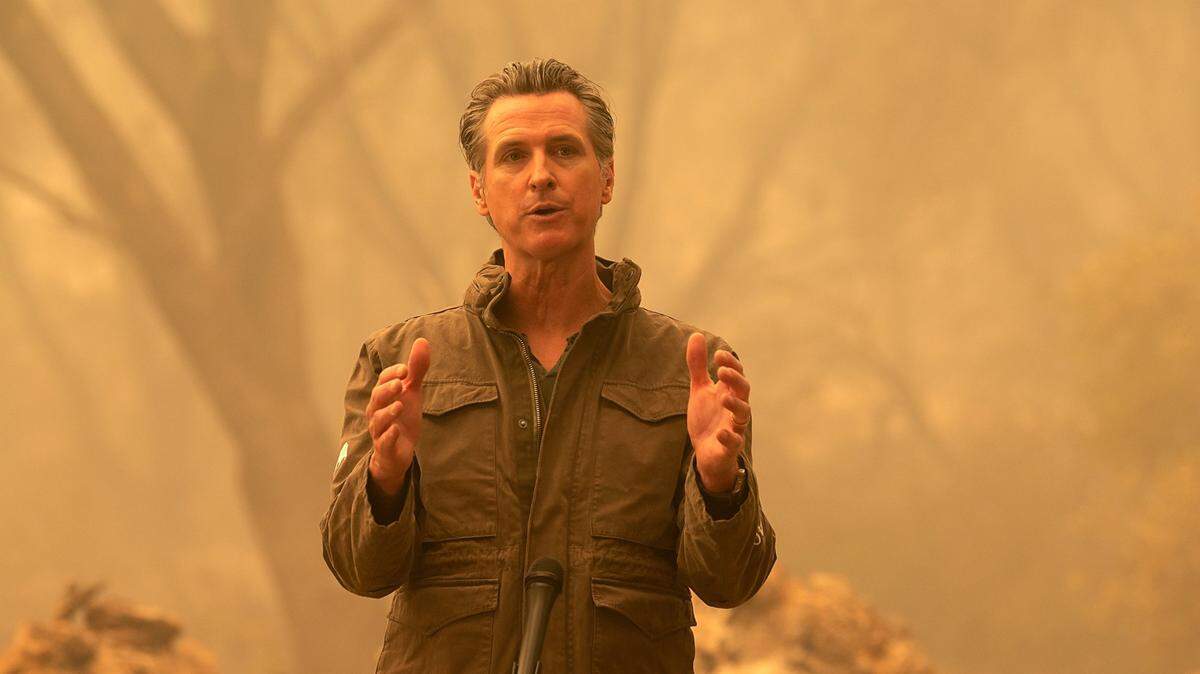 Gov. Gavin Newsom talks to media after he toured the North Complex Fire zone in Butte County on Friday, Sep 11, 2020 outside of Oroville.