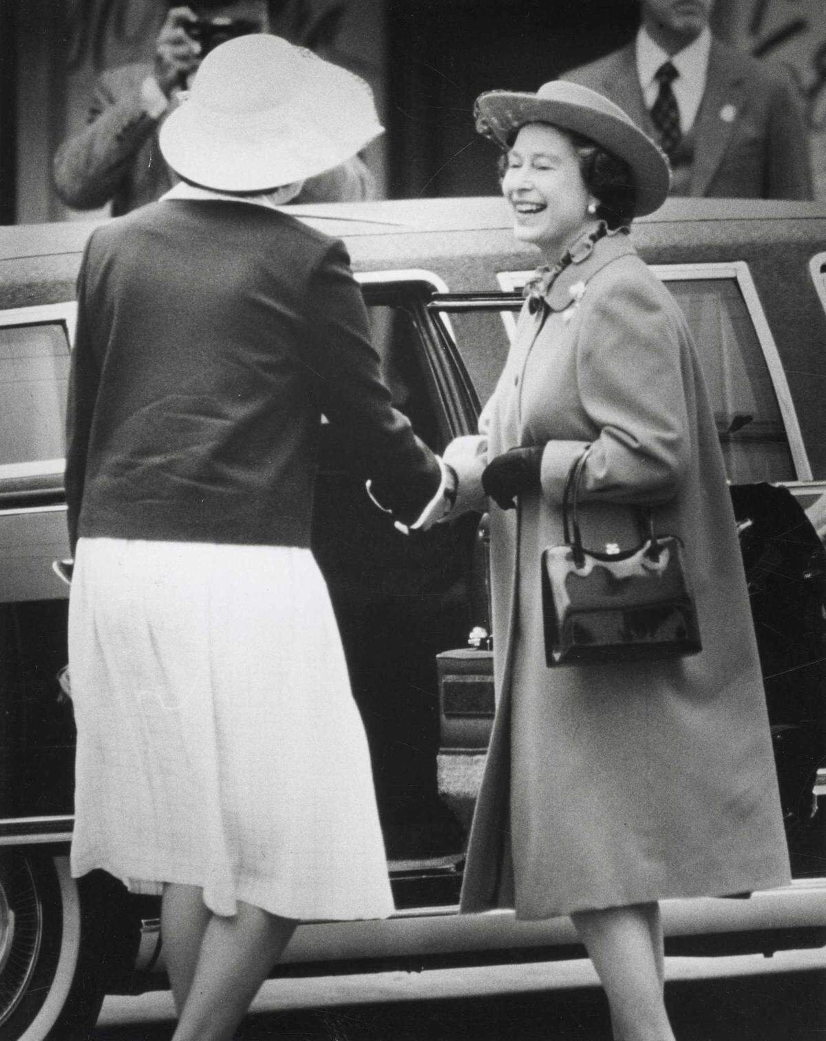 Queen Elizabeth II returns to her limosine after visiting Sutter’s Fort in Sacramento on March 4, 1983.