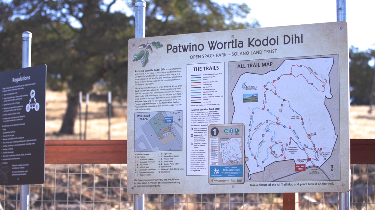 A sign with trails at the Patwino Worrtla Kodoi Dihi Open Space Park in Fairfield, California. 