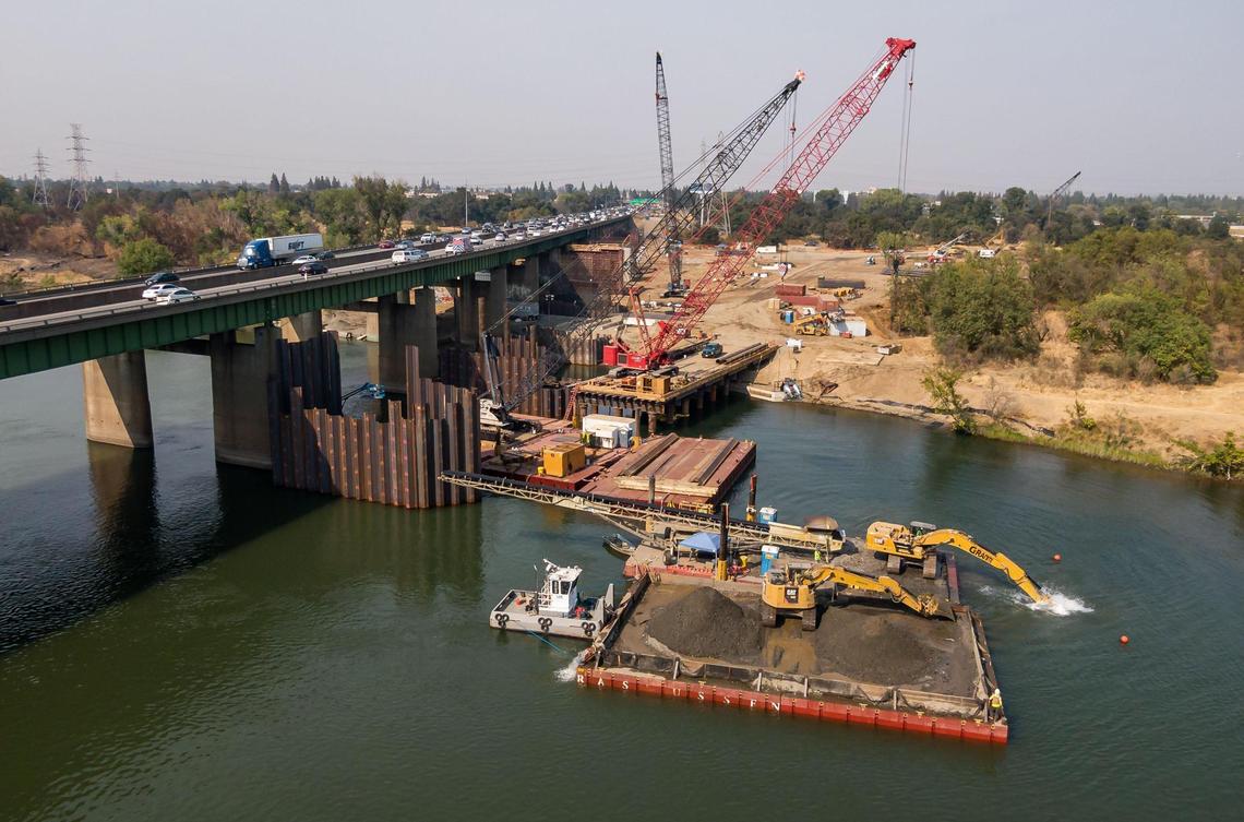 Drone imagery shows early construction work on the American River bridge deck replacement project on the Capital City Freeway, also known as Business 80, looking north over the American River bridge Friday, Sept. 9, 2022, near Cal Expo in Sacramento.
