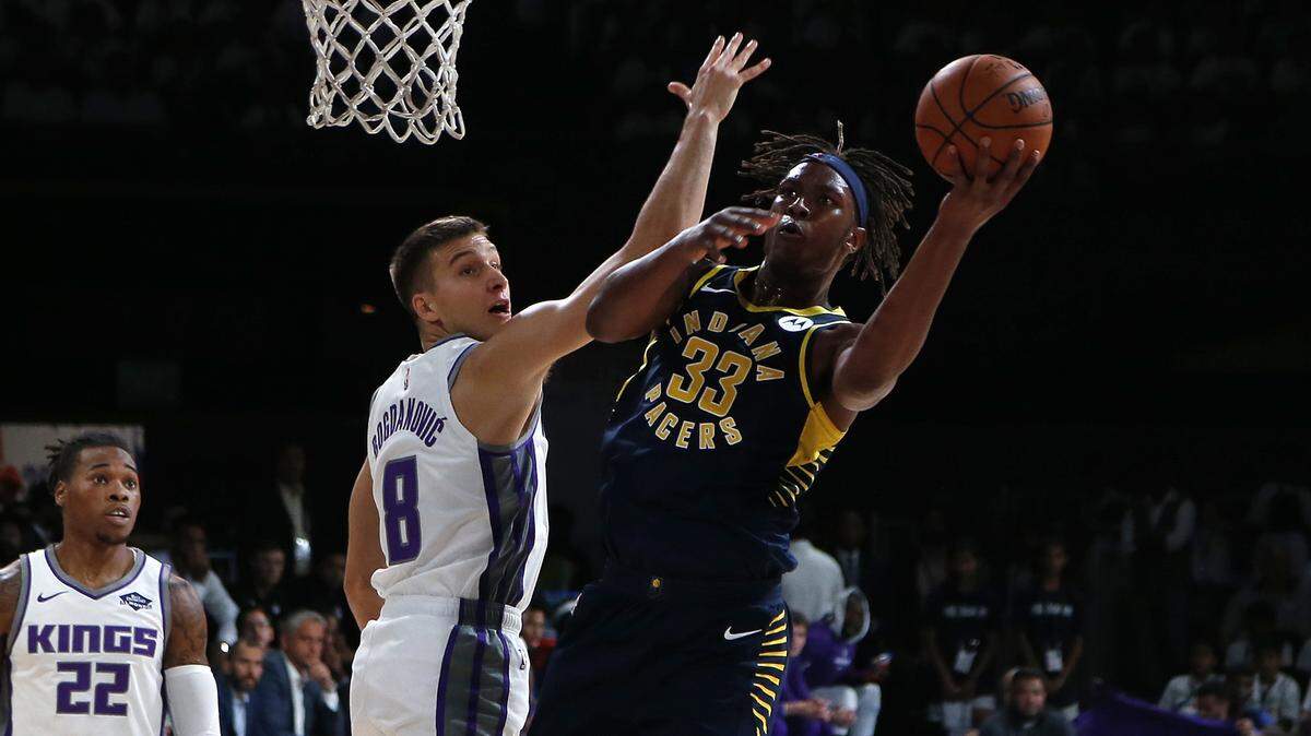 Sacramento’s Bogdan Bogdanovic defends Indiana’s Myles Turner during their game Friday.