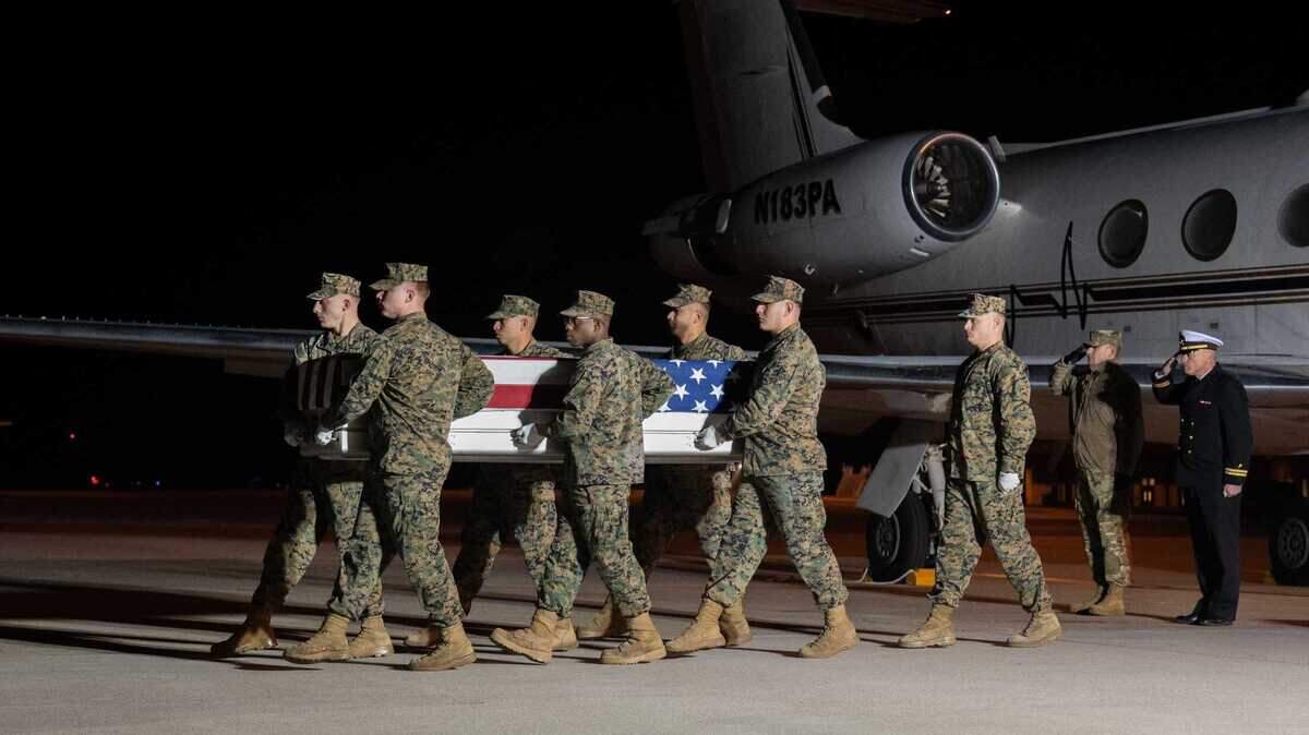 A Marine Corps carry team transfers the remains of Marine Cpl. Elwin A. Ramirez of Lodi, California, at Dover Air Force Base, Delaware. on Thursday, Dec. 22, 2022. Ramirez was assigned to Marine Corps Embassy Security Group, Abuja, Nigeria.