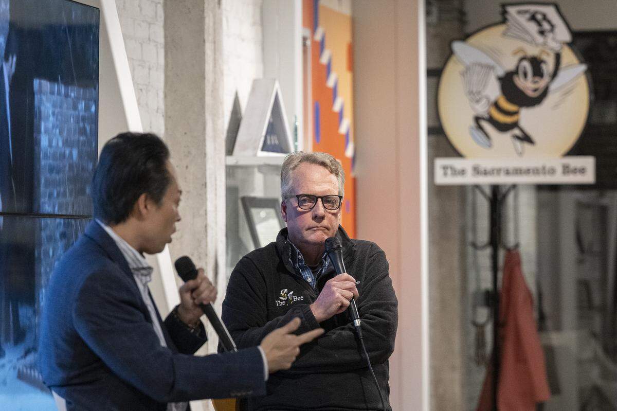 Retired Sacramento Bee reporter Sam Stanton, right, interviews Sacramento County District Attorney Thien Ho about Ho’s experience prosecuting the Golden State Killer during a live Q&A at The Sacramento Bee’s office in Sacramento on Tuesday, Dec. 9, 2025.