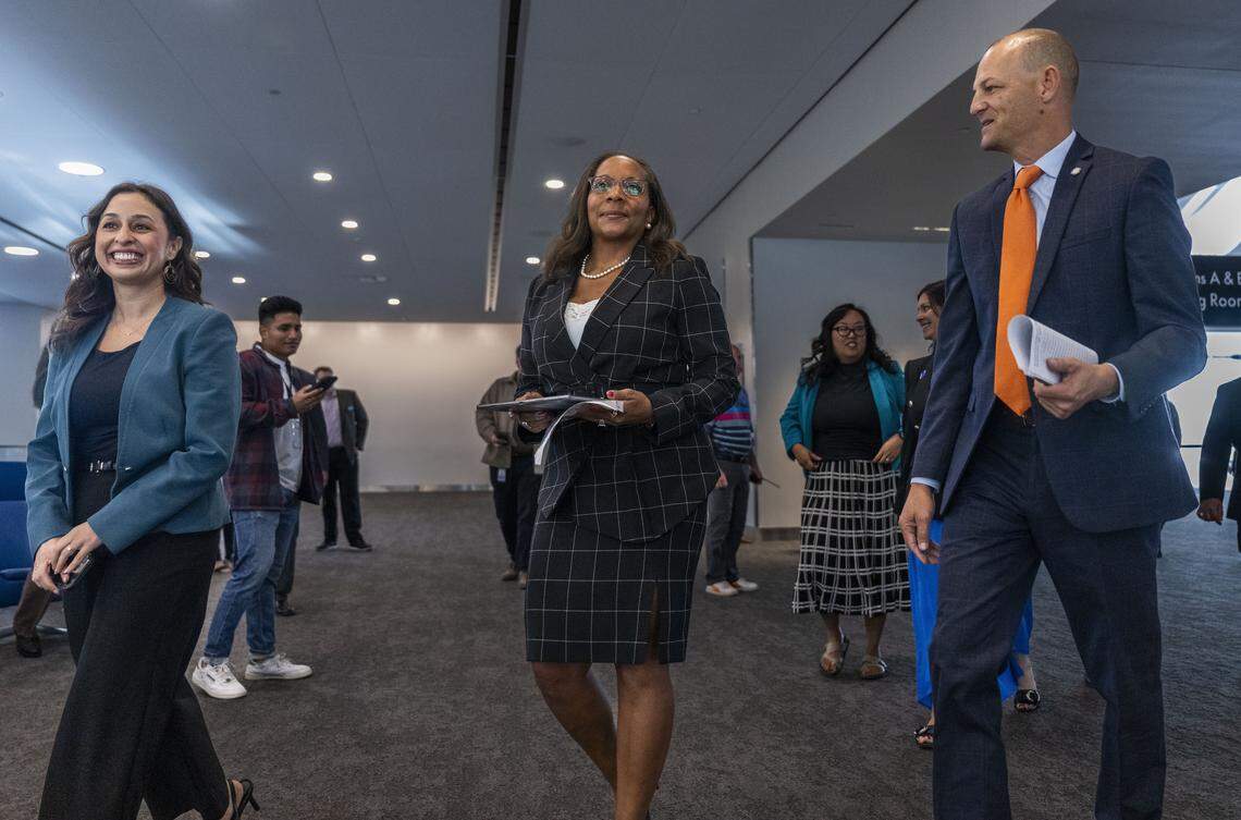 Incoming Sacramento City Manager Maraskeshia Smith, center, walks with Councilmember Karina Talamantes and Mayor Kevin McCarty to her introductory news conference on Sept. 30. Smith, was previously the city manager in Santa Rosa, started in her new role on Monday.