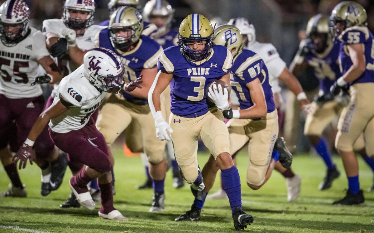 Bradshaw Christian Pride running back Brandon Burden (3) carries the ball into scoring position against the Union Mine Diamondbacks, and later runs in the touchdown, during the second quarter at the high school football game Friday, Sept. 29, 2023, at Bradshaw Christian.