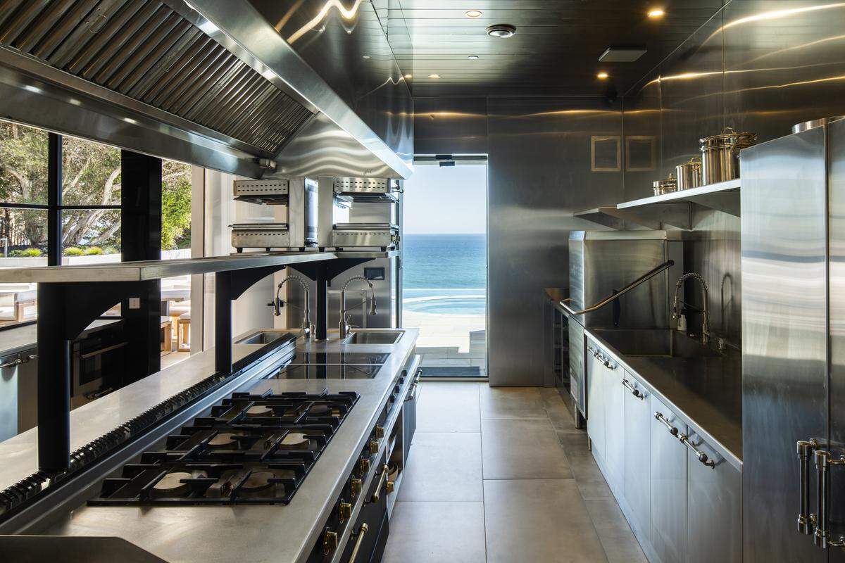 Wellness and entertainment amenities extend to a full commercial-grade kitchen, fitness center with underwater pool views, private nightclub and an underground garage accommodating up to ten vehicles.