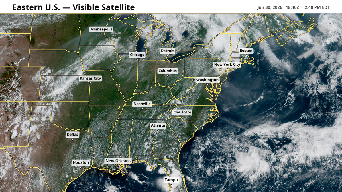 Satellite view of the eastern U.S. on Tuesday, June 30. Most heavy storm clouds are pushed north into Canada by this heat dome.