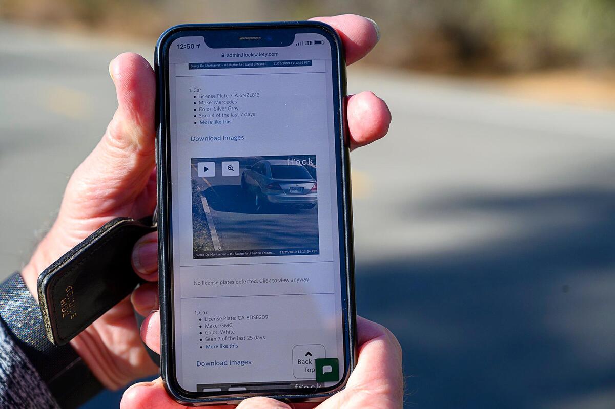 Hans Geyer, president of the homeowners association holds the app showing the licenses plates of vehicles entering the Loomis community Sierra de Montserrat on Monday, November 25, 2019 in Rocklin. After two property crimes occurred, the Loomis community Sierra de Montserrat gladly handed police footage of the alleged perpetrators.