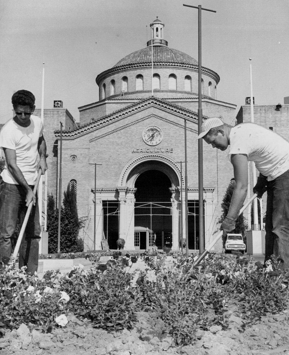 Workers tend the flowers during the California State Fair in 1958 at its old site on Stockton Boulevard in Sacramento. 