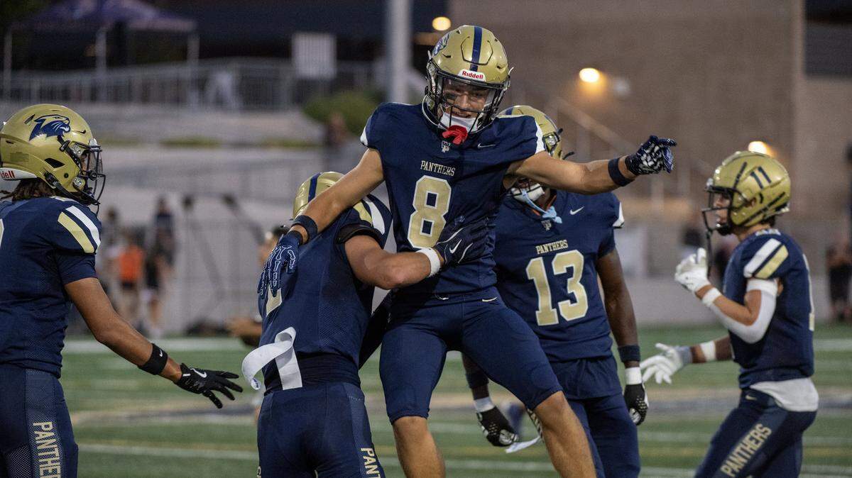 The West Park Bulldogs’ Deacon Ogden (8) celebrates with Gavin McDaniel (1) after scoring a touchdown against the Vacaville Bulldogs in the first half on Friday, Aug. 29, 2025, in Roseville.