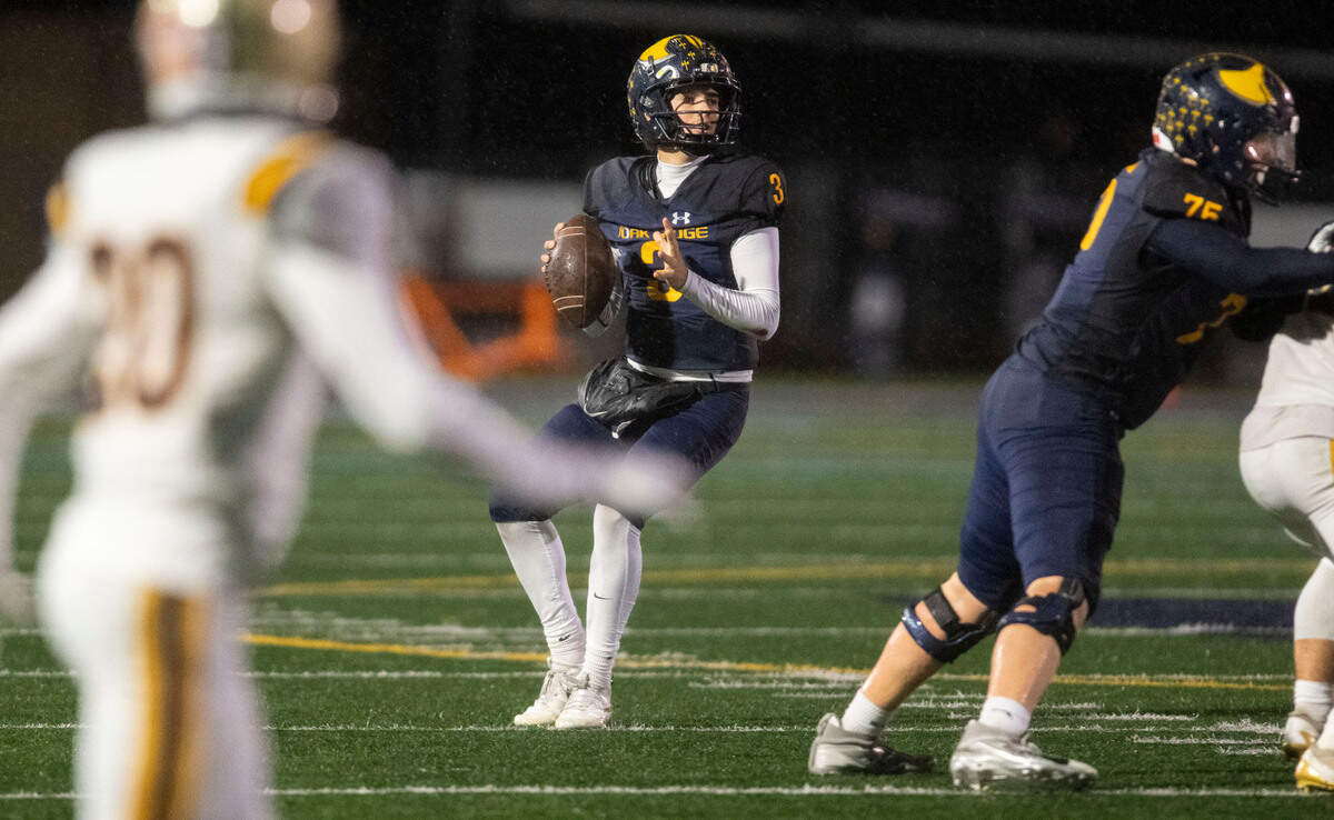 Oak Ridge Trojans quarterback Joaquin Graves-mercado (3) looks downfield before attempting a 45-yard pass to tight end Kaleb Edwards in a Sac-Joaquin Section semifinal playoff game on Friday in El Dorado Hills. The pass fell incomplete.
