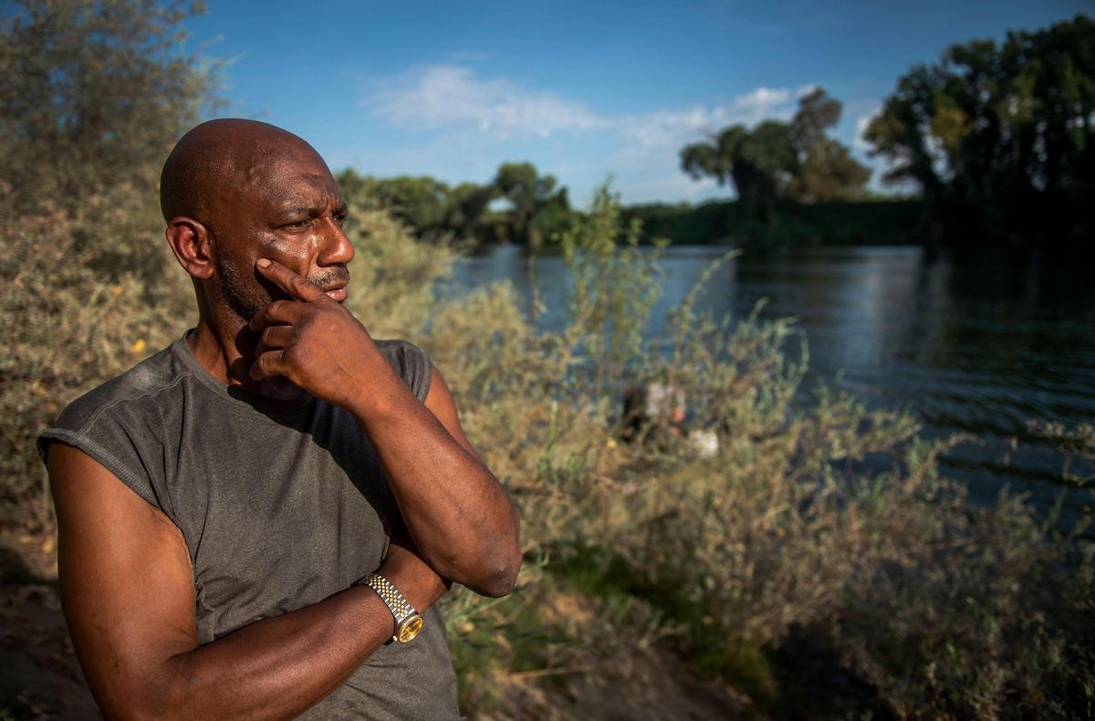 Tommie McKinnie, who is homeless and lives along the American River, talks about his experience with the lack of bathrooms along the river in Sacramento on Aug. 28.