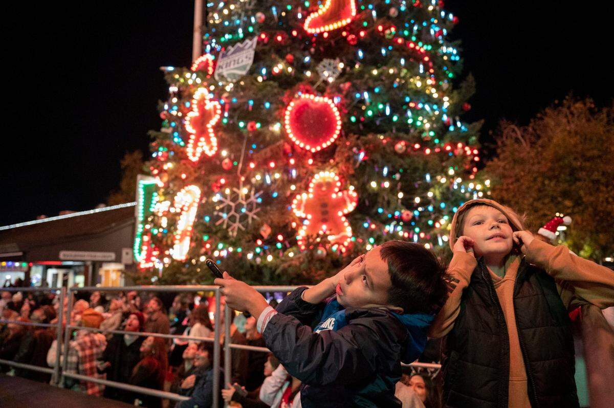 Kids cover their ears as fireworks go off during the holiday tree lighting and first performance of Theatre of Lights of the season Wednesday, Nov. 22, 2023, in Old Sacramento.