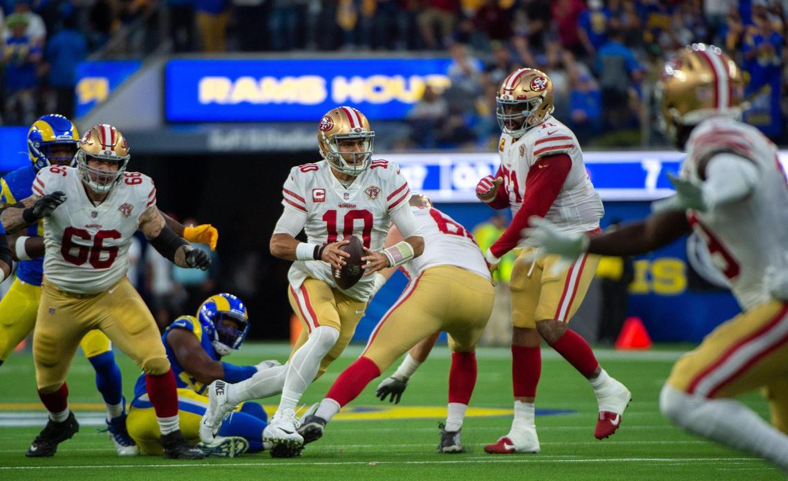 San Francisco 49ers quarterback Jimmy Garoppolo (10) gained yardage on a keeper in the second quarter during the NFL Championship game at SoFi Stadium on Sunday, Jan.30, 2022 in Los Angeles.