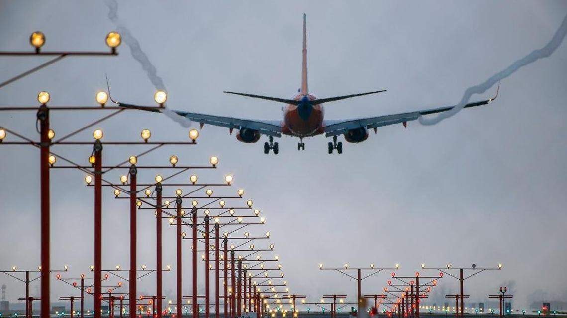 An airliner lands at the Sacramento International Airport in Sacramento on Wednesday, January 20, 2016. 