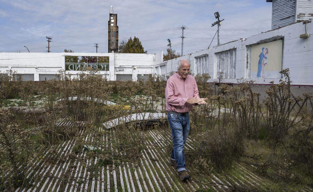 Rob Kerth walks on the pipes that create the ice for Iceland Ice Skating Rink in North Sacramento on Wednesday. Kerth is working on the reconstruction of the family owned business that burned in 2010.