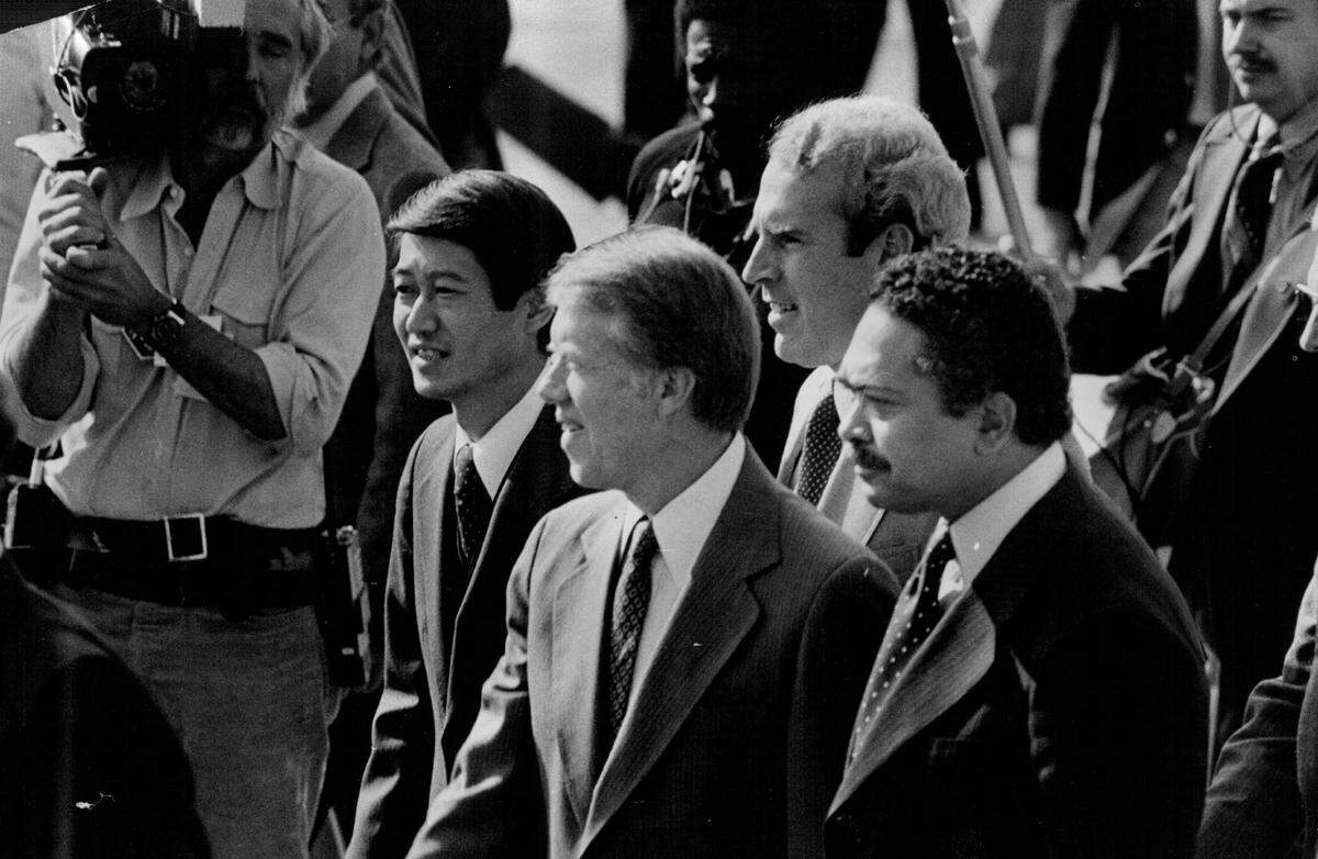 President Jimmy Carter walks to rally in K Street Mall on Nov. 3, 1978, with congressional hopefuls Robert Matsui, left, and Vic Fazio, behind Matsui. Mervyn Dymally, right, is incumbent candidate for lieutenant governor.
