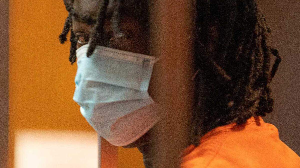 Troy Davis appears at his 2021 arraignment in Sacramento Superior Court. A police detective, testifying during the opening of Davis' trial Wednesday, said that Davis admitted he attacked and killed Kate Tibbitts and her two dogs in her Land Park home two years ago.
