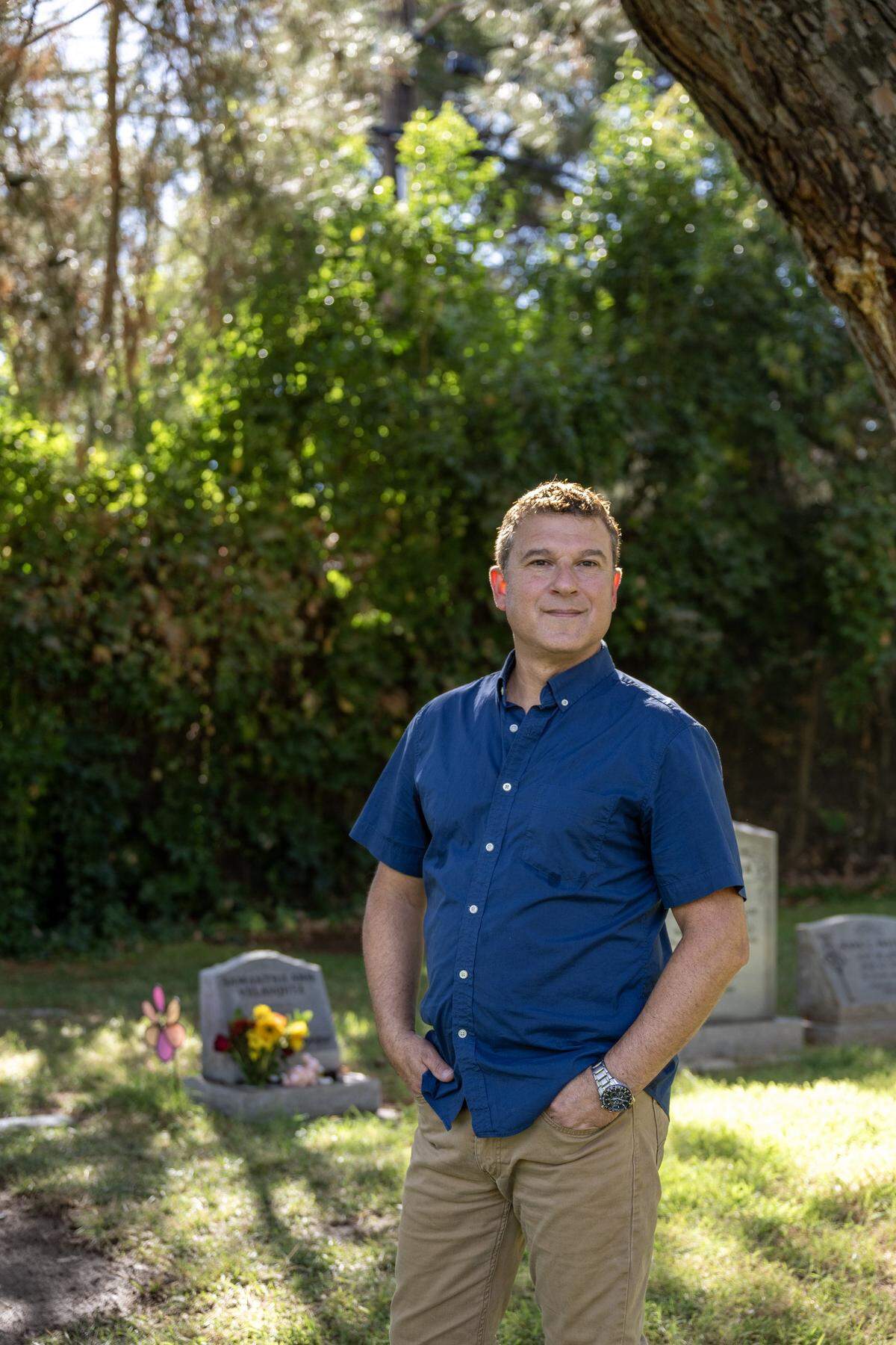 Mark Velasquez visits his daughter Samantha’s burial site at the Odd Fellows Cemetery in Sacramento in September. Velasquez is advocating for a new public cemetery.
