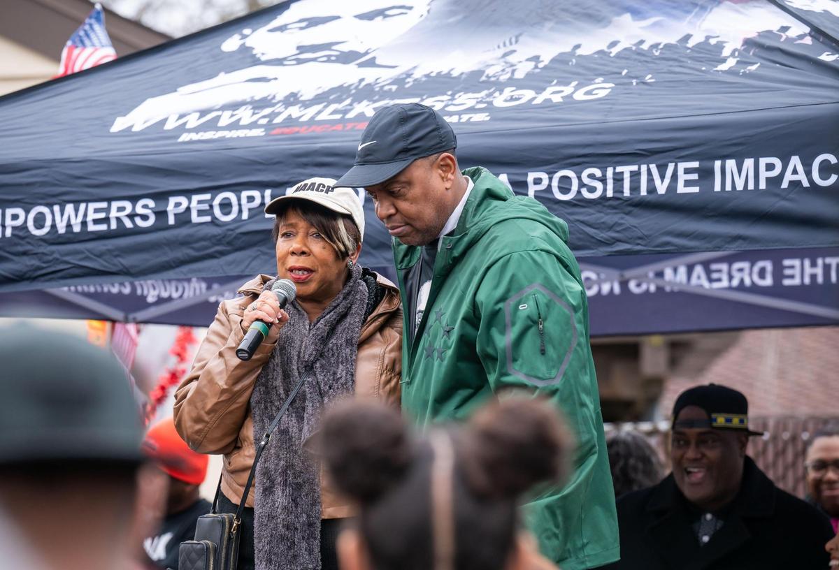 Betty Williams, left, president of Sacramento NAACP, speaks alongside Sam Starks, founder of MLK365, to the crowd of thousands gathered at Sacramento City College for the MLK365 March for the Dream honoring Martin Luther King Jr. on Monday, Jan. 16, 2023, in Sacramento. The main march began and ended at Sacramento City College in a “love loop” that included Land Park Drive, Broadway and Freeport Boulevard.