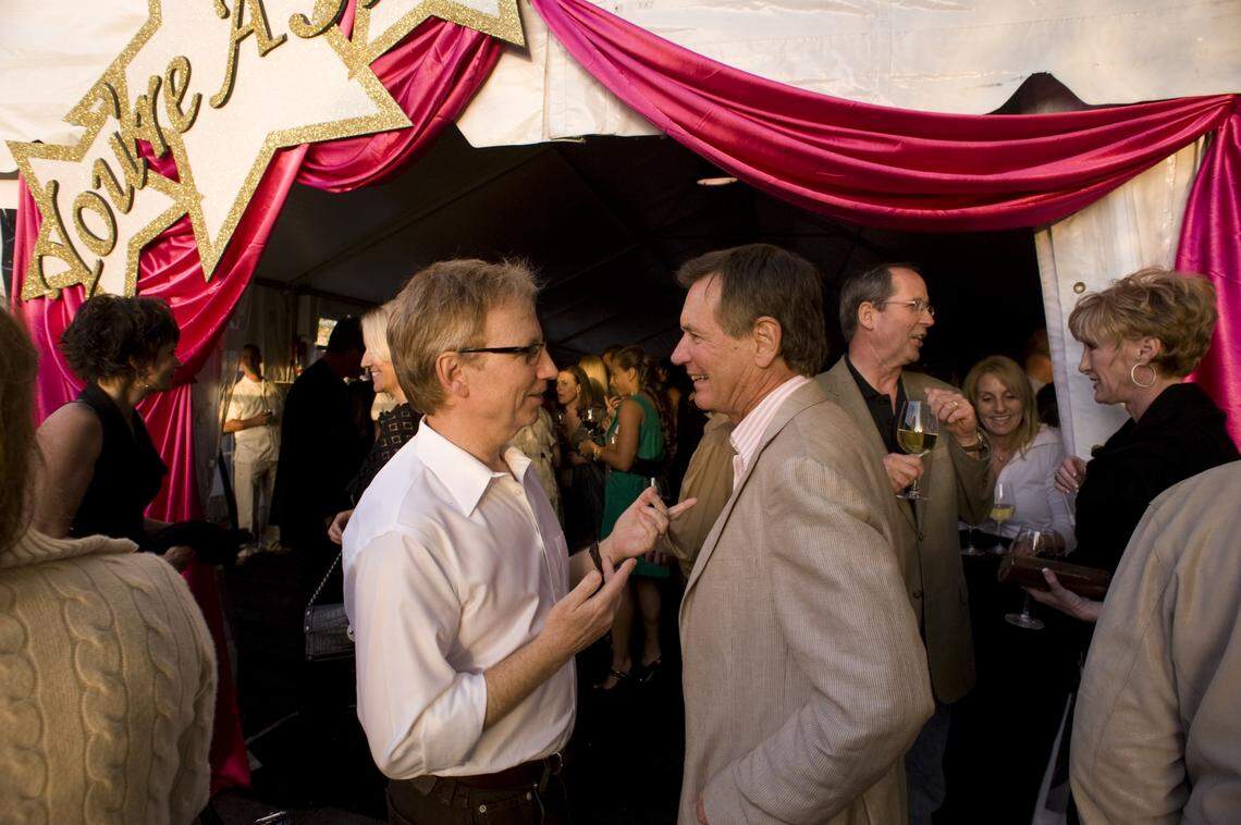 B Street Theatre artistic director Buck Busfield, left, and Randy Paragary, a B Street board member, enjoys an evening of fund raising for the theater in 2010.
