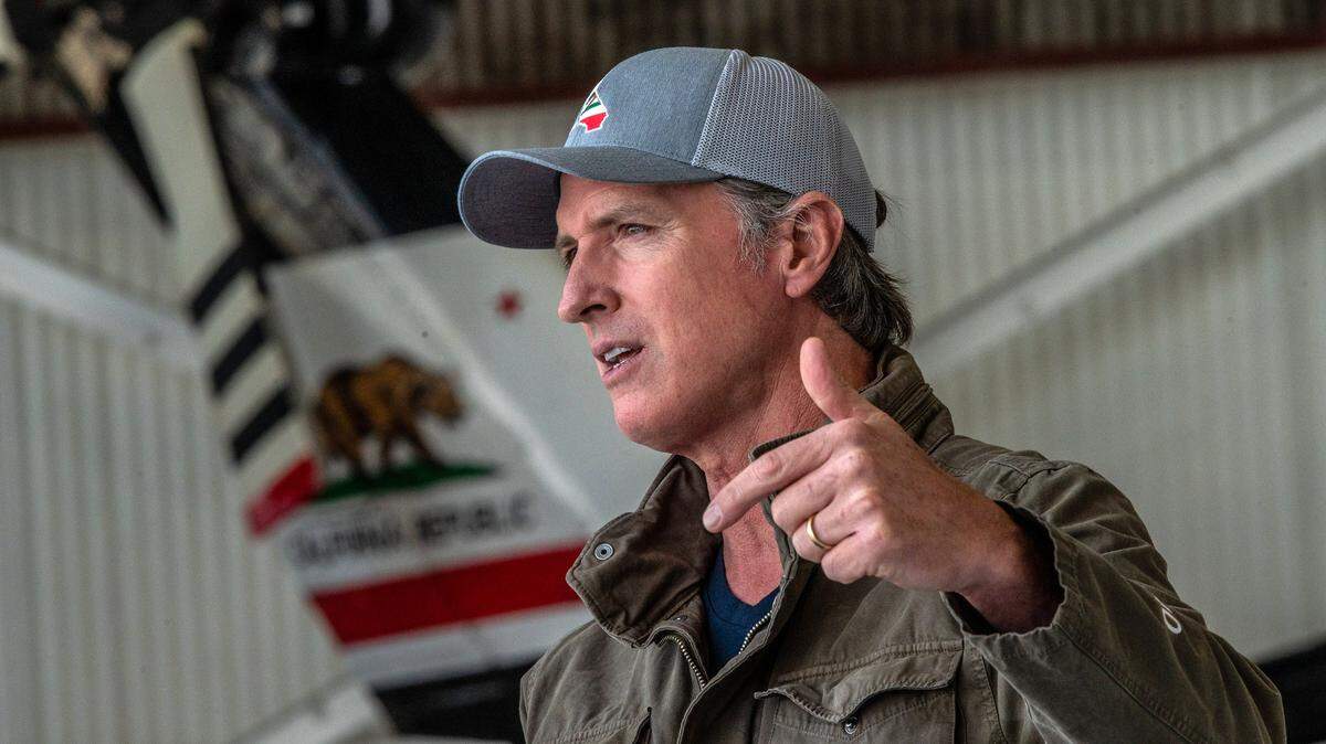California Gov. Gavin Newsom highlights new firefighting equipment and his proposed $2 billion investment in wildfire and emergency preparedness at a press conference at Cal Fire’s airbase in McClellan Park in Sacramento County on Monday, May 24, 2021.