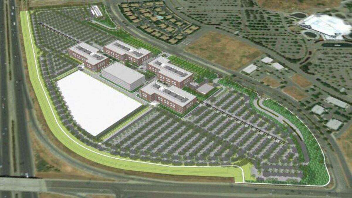 An architectural rendering shows the aerial view of a large corporate campus planned for East Commerce Way and Arena Boulevard in Sacramento’s North Natomas neighborhood. The campus may be the West Coast headquarters of health insurance company Centene.
