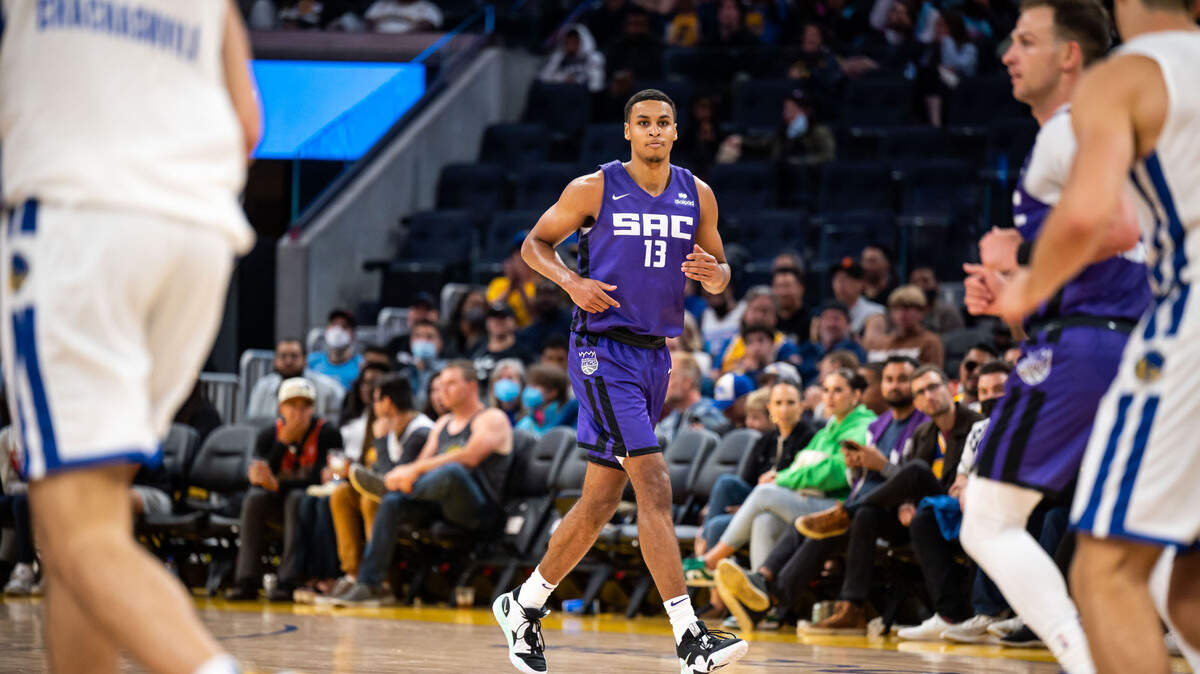Sacramento Kings forward Keegan Murray (13) trots calmly down the court after sinking back-to-back three point baskets against the Golden State Warriors during the third period of the California Classic NBA preseason basketball game Saturday, July 2, 2022, at Chase Center in San Francisco.